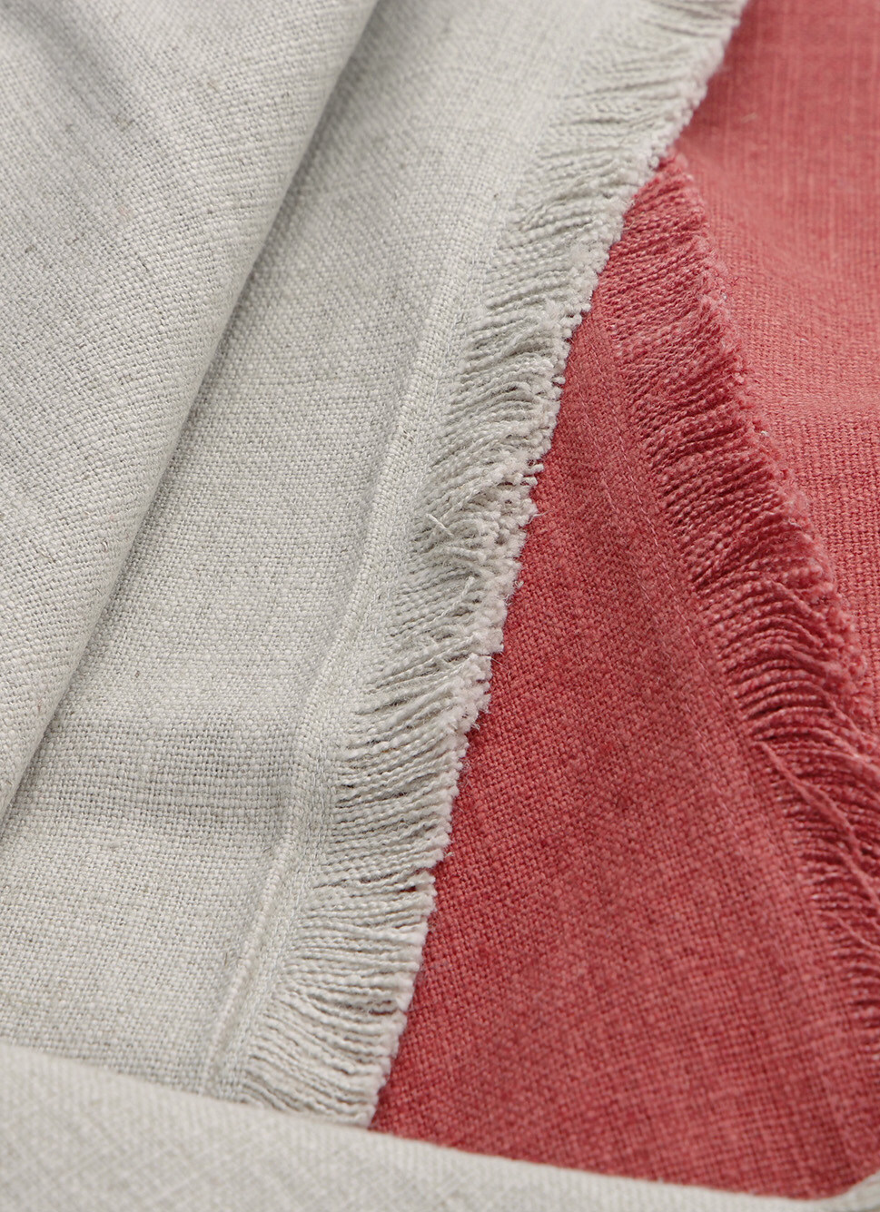 HOUSSE DE COUSSIN TEXTURÉE à MINI FRANGE BRIQUE