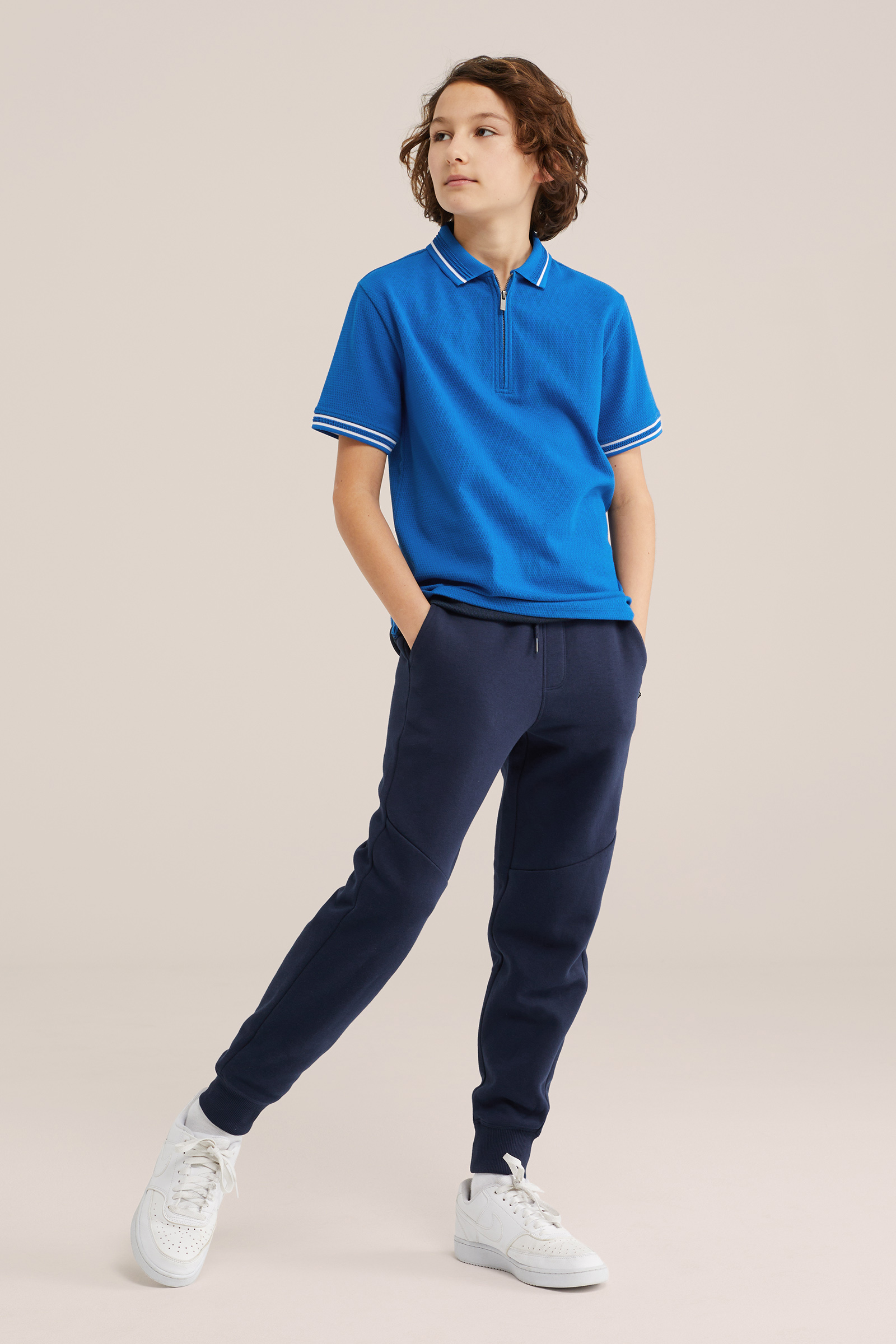 Jongens polo met quarter-zip en structuur