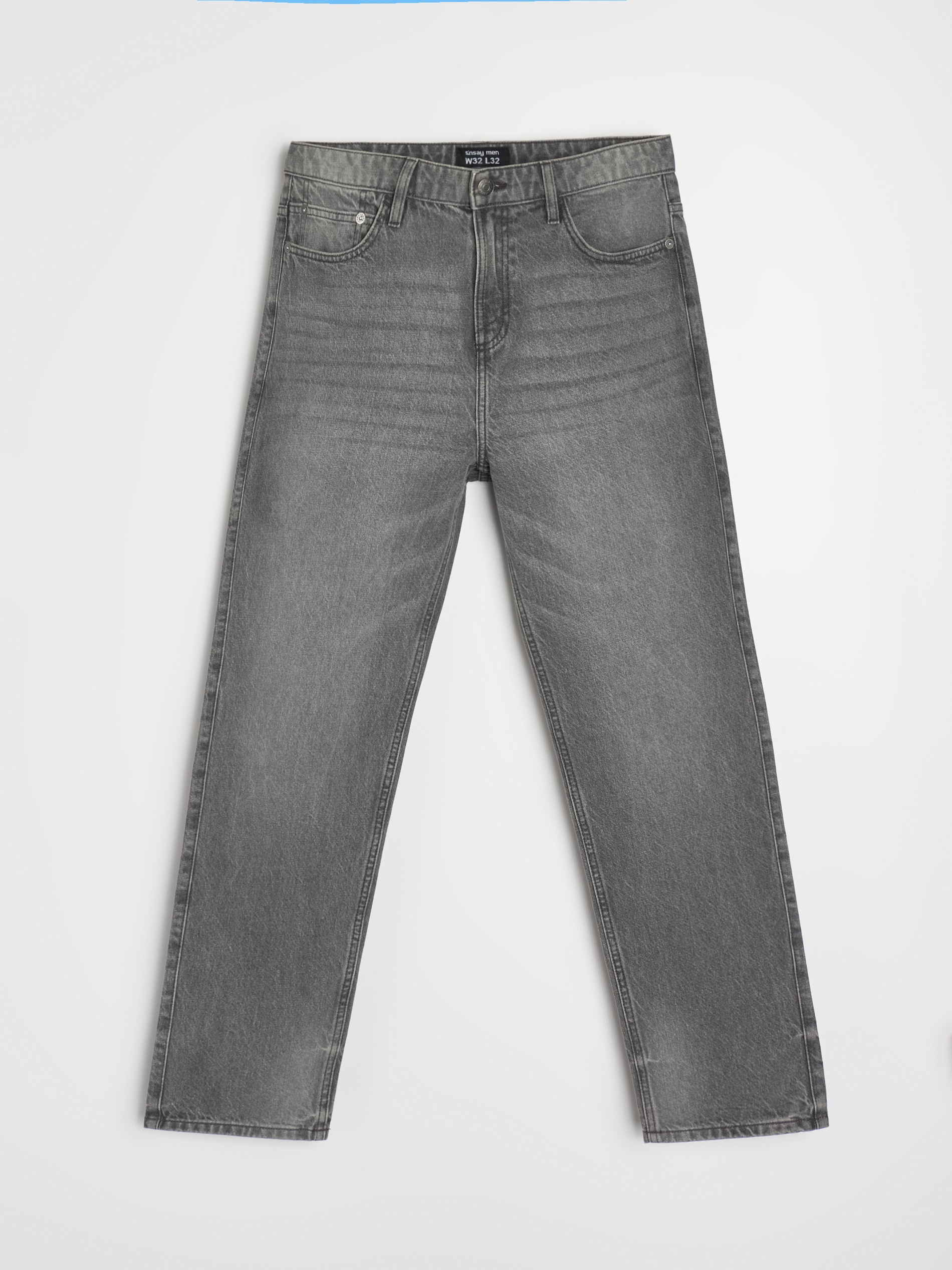 Jeansy loose fit z elektem sprania