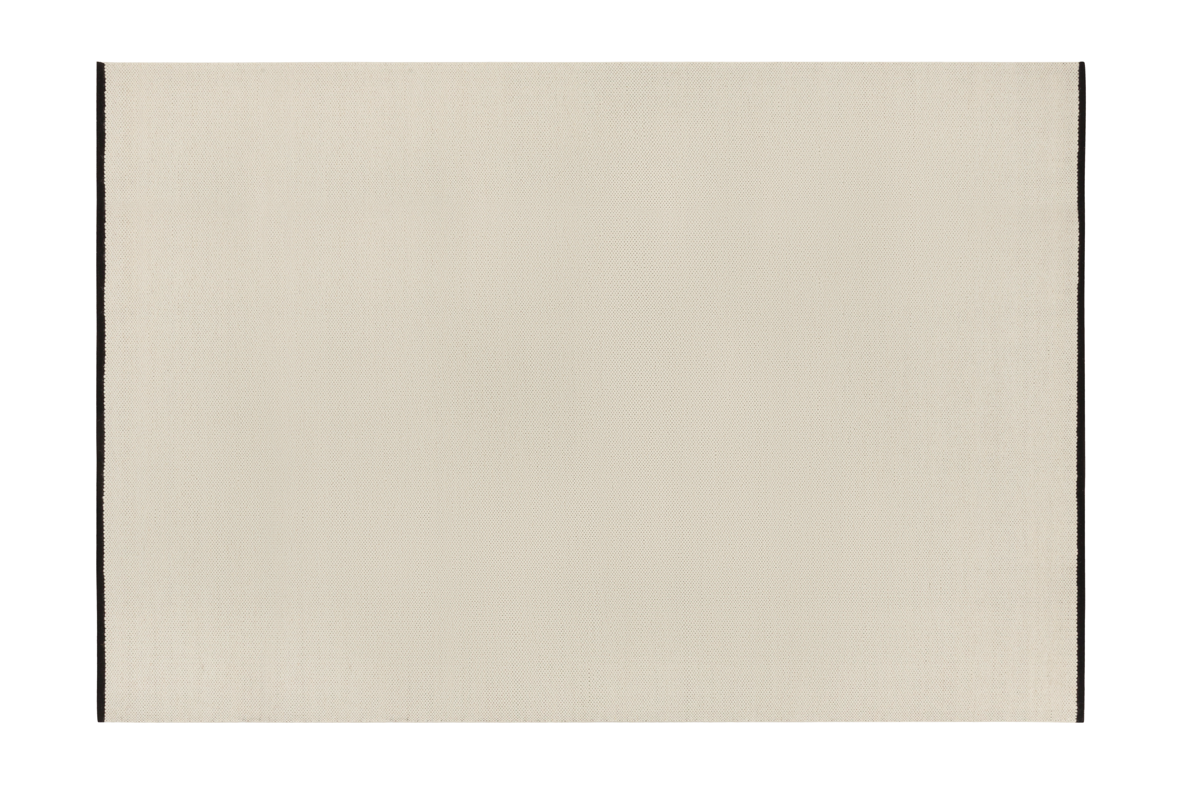 noo.ma handgeweven vloerkleed van Nieuw-Zeelandse wol, beige met Vulcano Black randaccent - rechthoekig, laagpolig 1 cm
