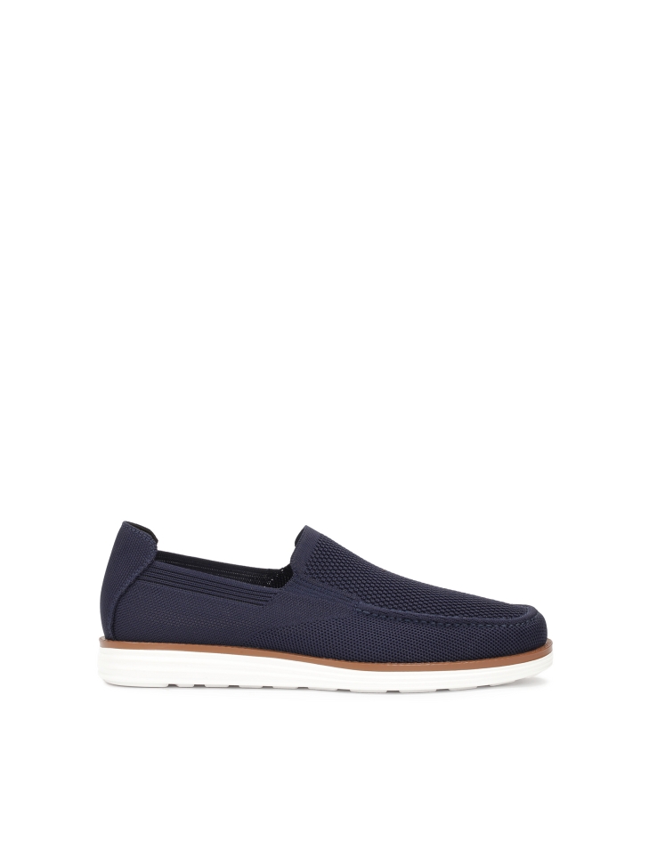 Navy blue slip on shoes in stretch fabric