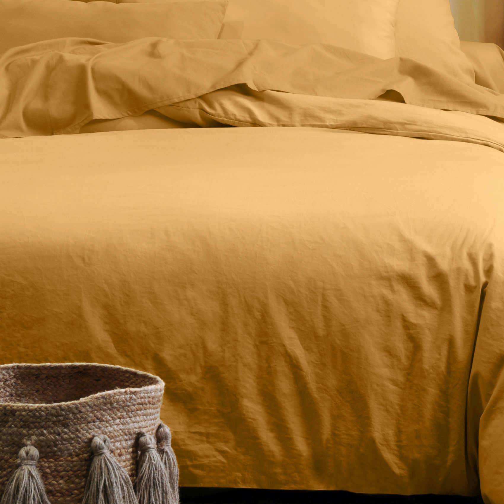 - Taie d'oreiller unie en coton bio jaune curry 65x65 cm