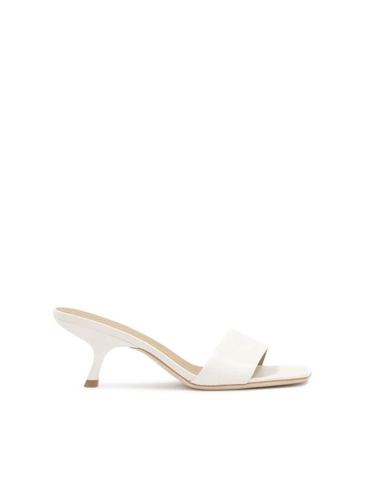White minimalist mules with fashionable heel