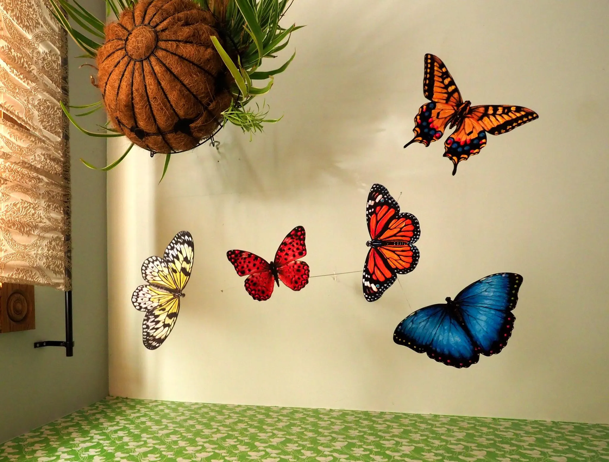 butterfly mobile with glow-in-the-dark paint elements