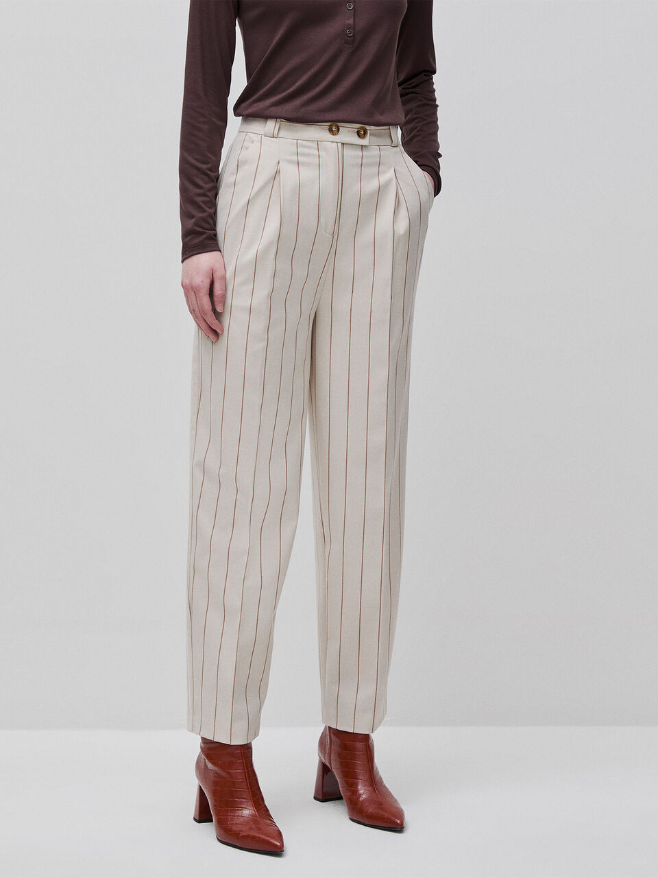 Carrot-fit pinstriped trousers