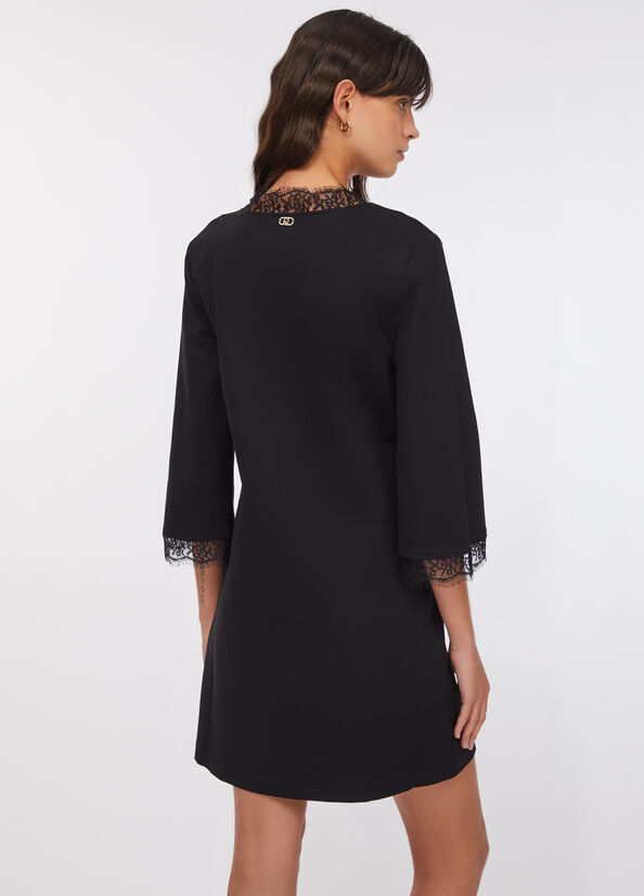 Abito corto con dettagli in pizzo