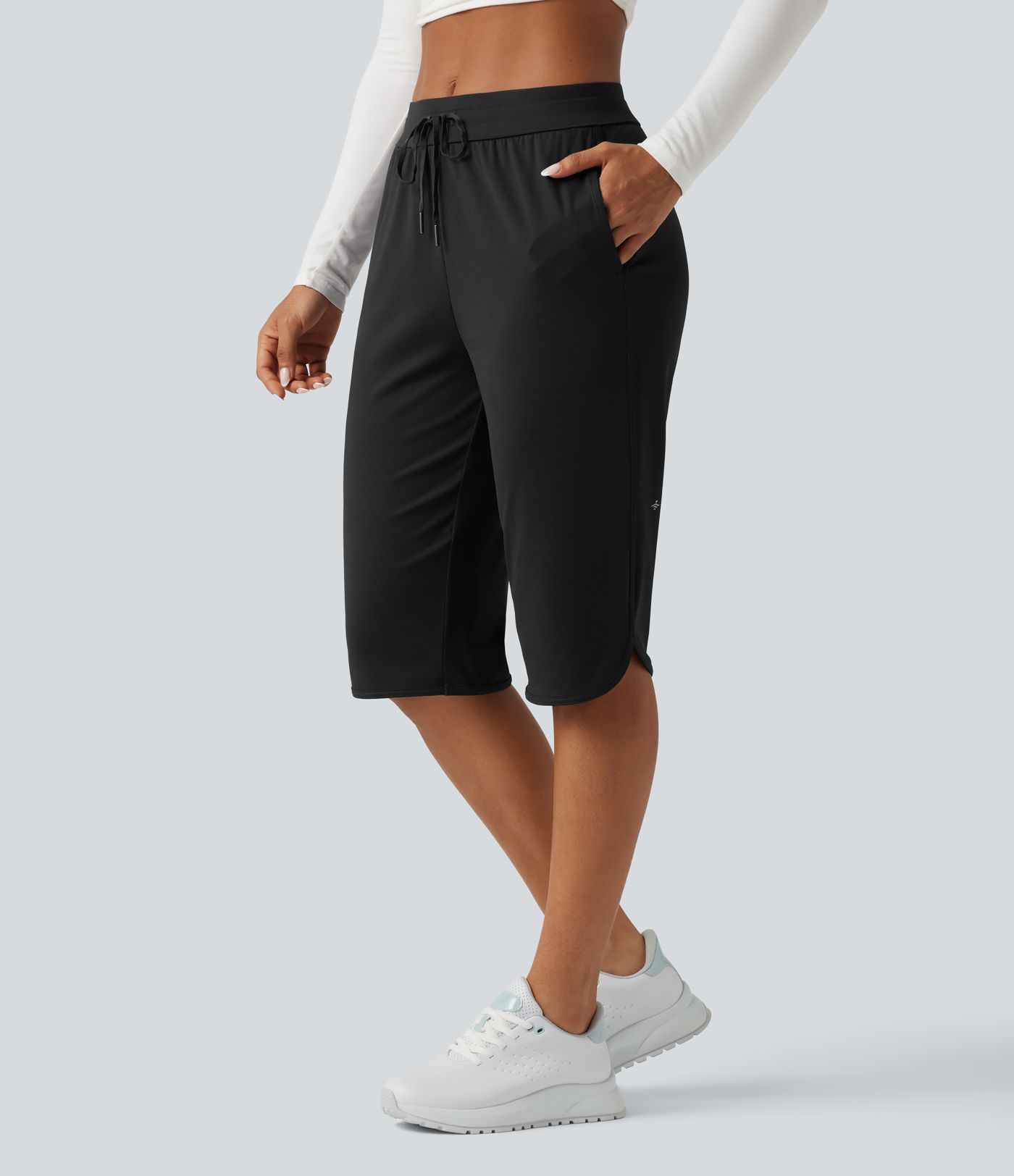 Pantacourt de golf taille mi-haute à séchage rapide avec cordon de serrage, ourlet arrondi, poches et protection solaire UPF40
