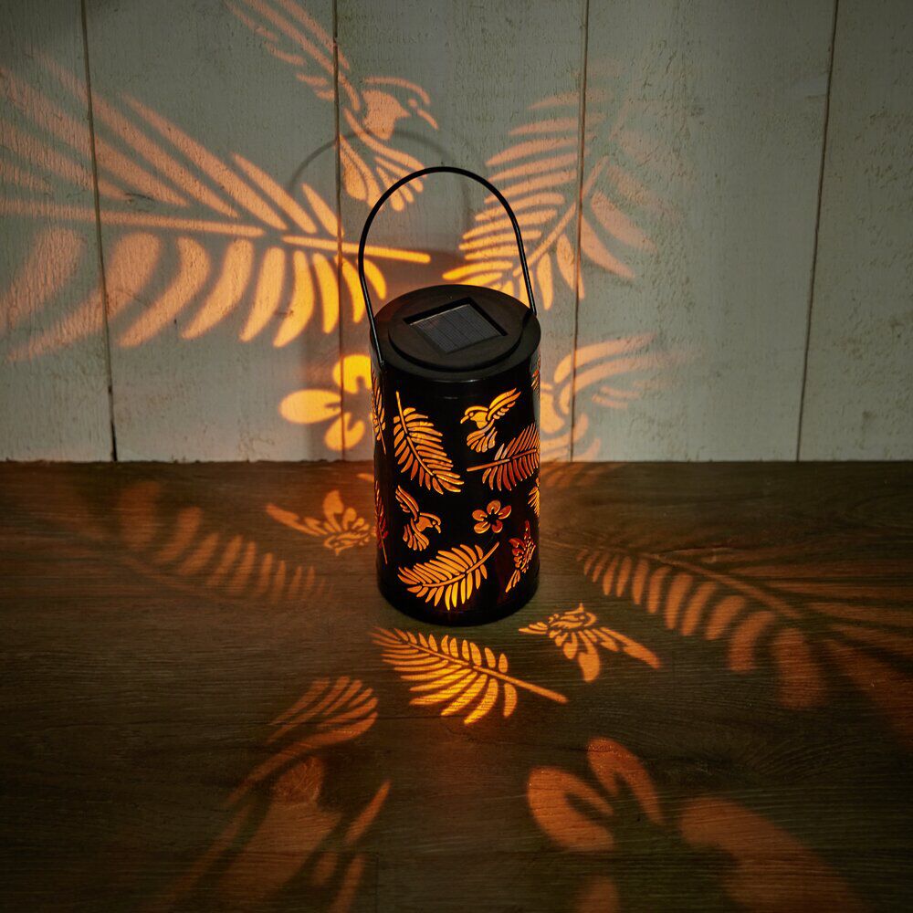 Lanterne solaire effet flamme métal noir ajouré motif feuillage 12LED blanc chaud Ø9xH16cm