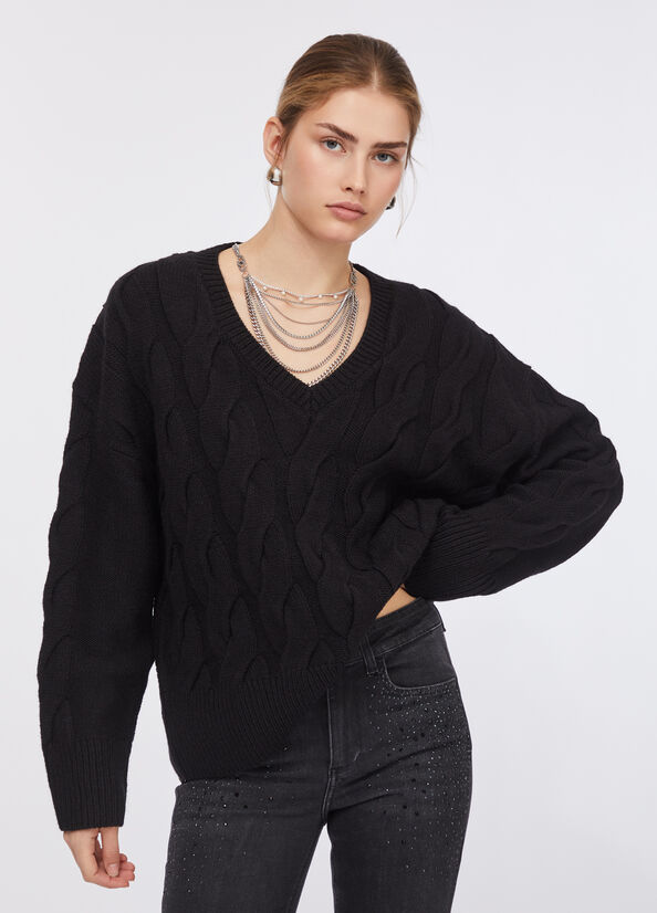Maglione in lana a trecce