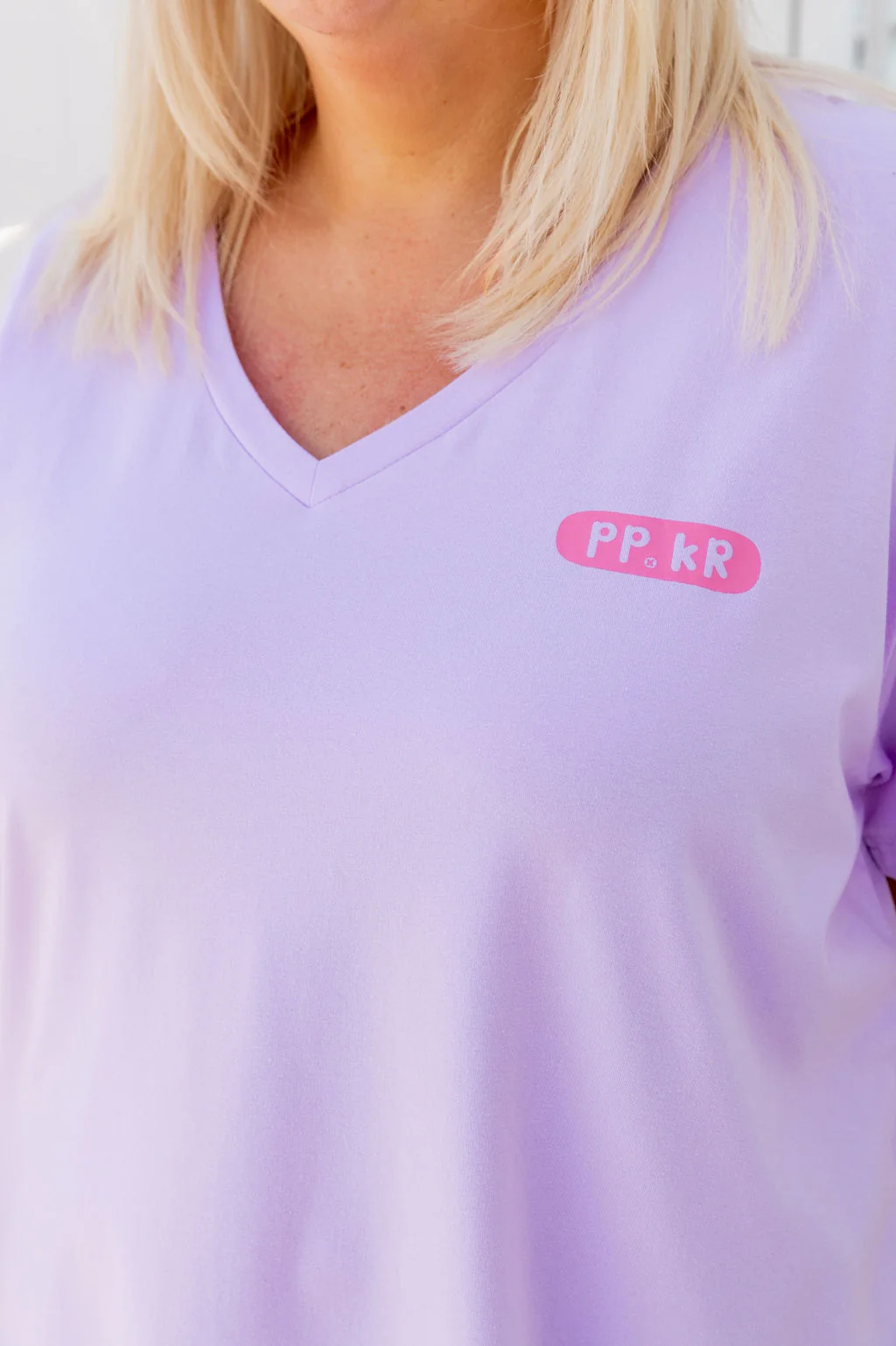 Della Relaxed V-Tee in Be Okay Lilac by Kasey Rainbow