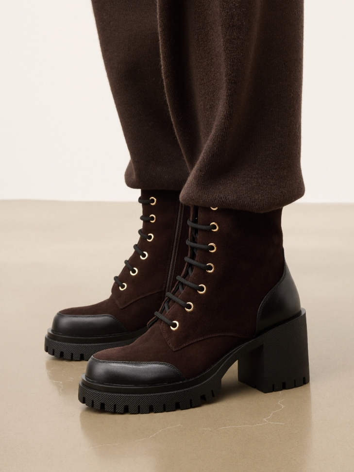 Brown boots with black inserts