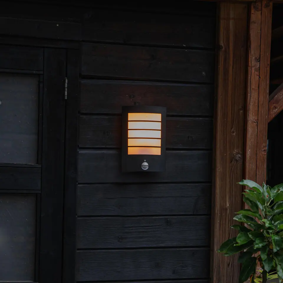 Qazqa wandlamp met bewegingssensor miro zwart e27