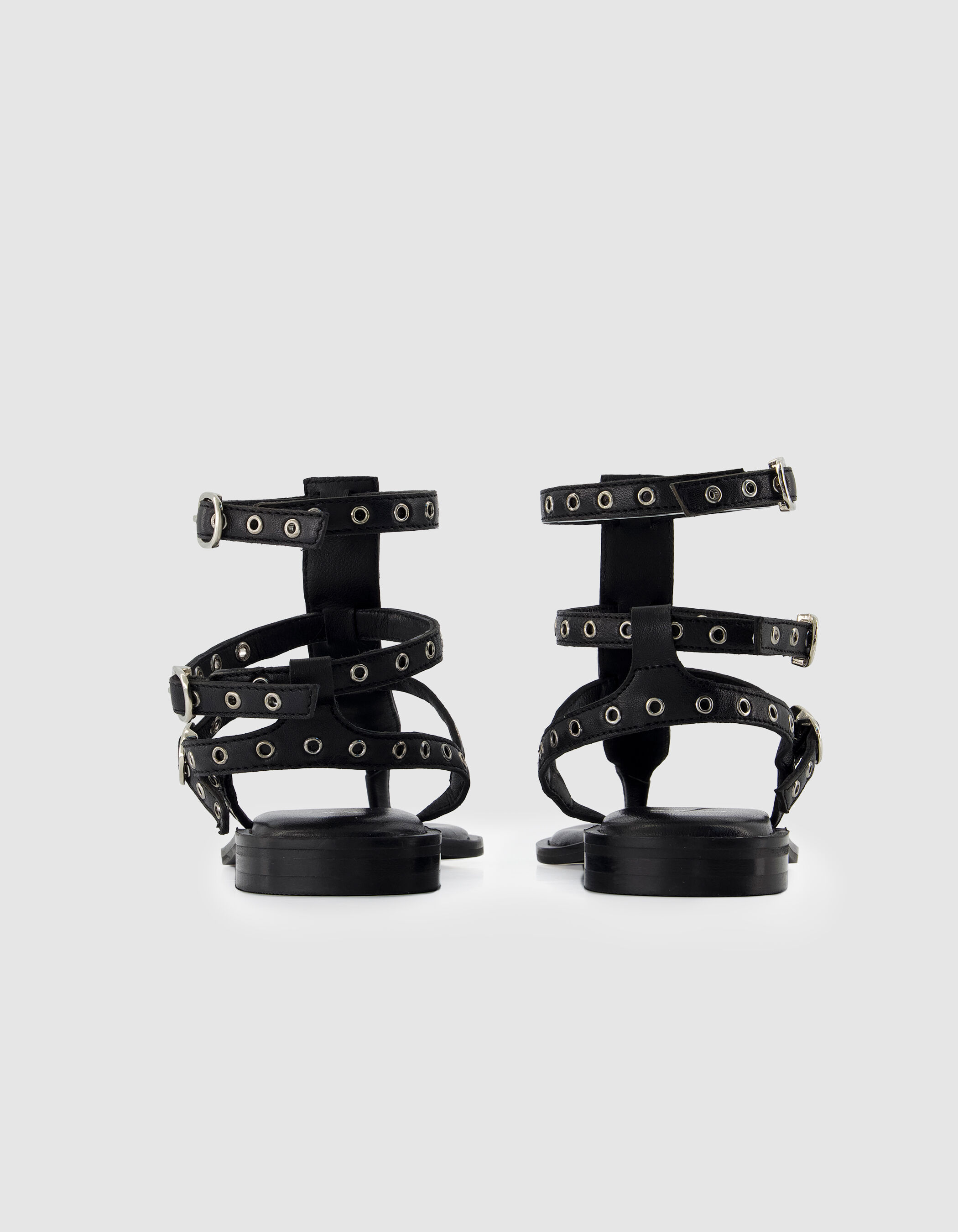 Sandales spartiates noires plates cuir Femme