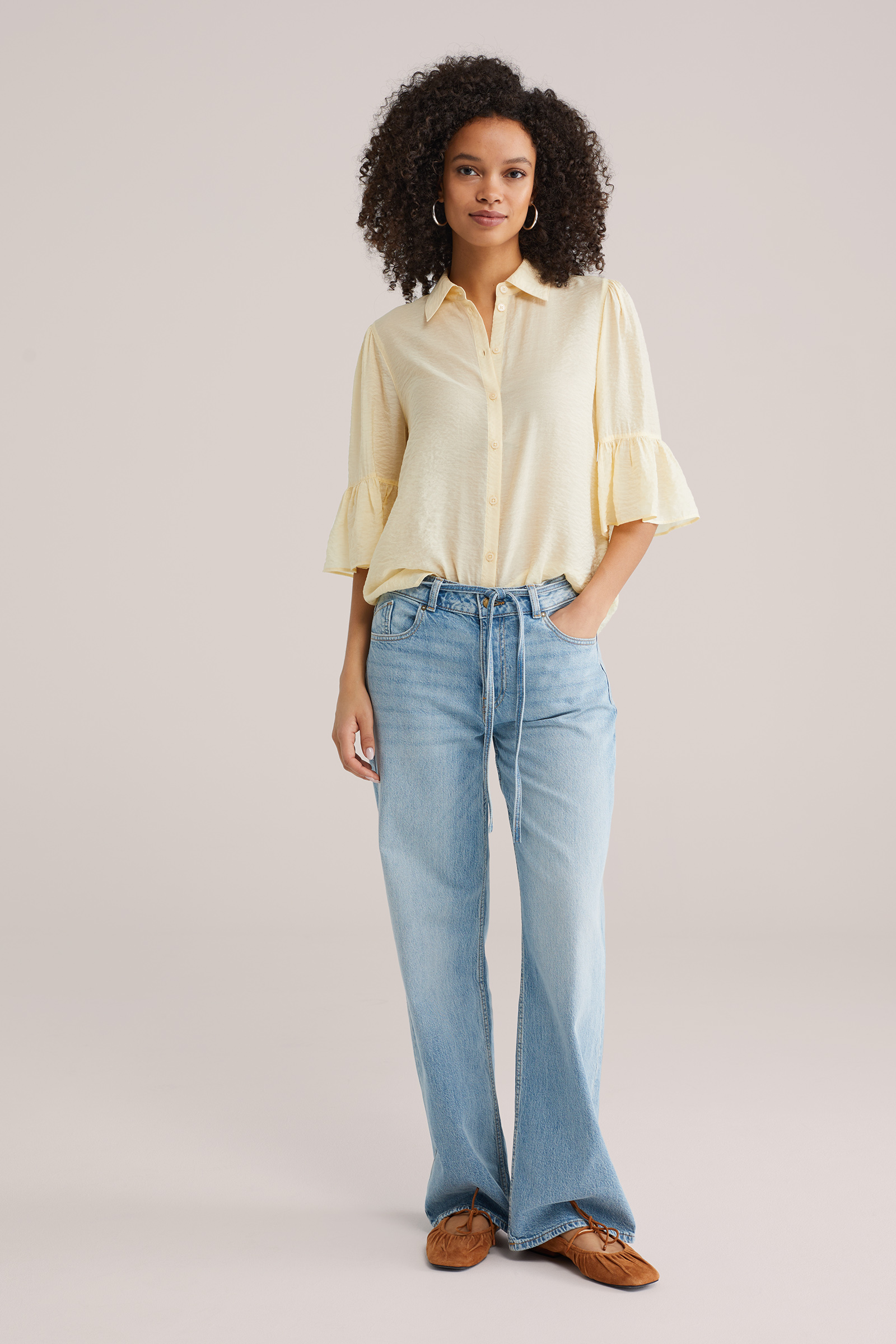 Dames blouse met trompetmouw