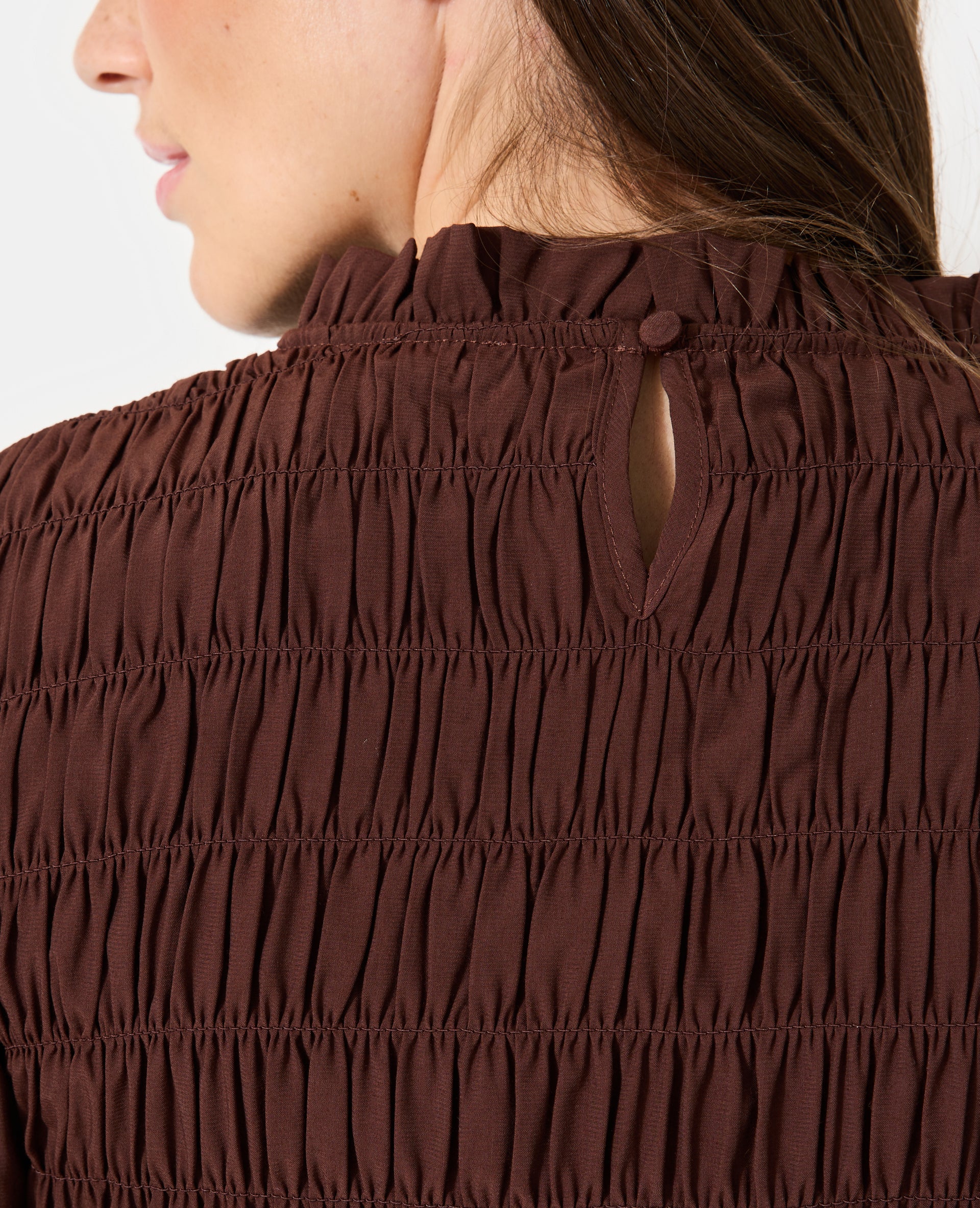 Blouse effet gaufré avec volants et manches ballons