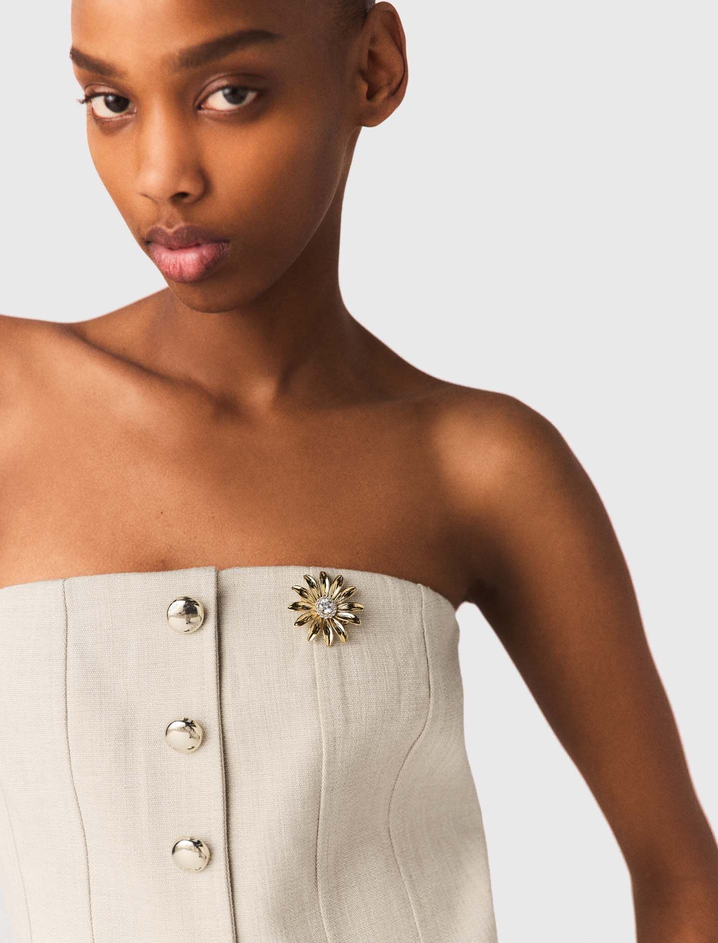 Broche fleurs dorée à strass