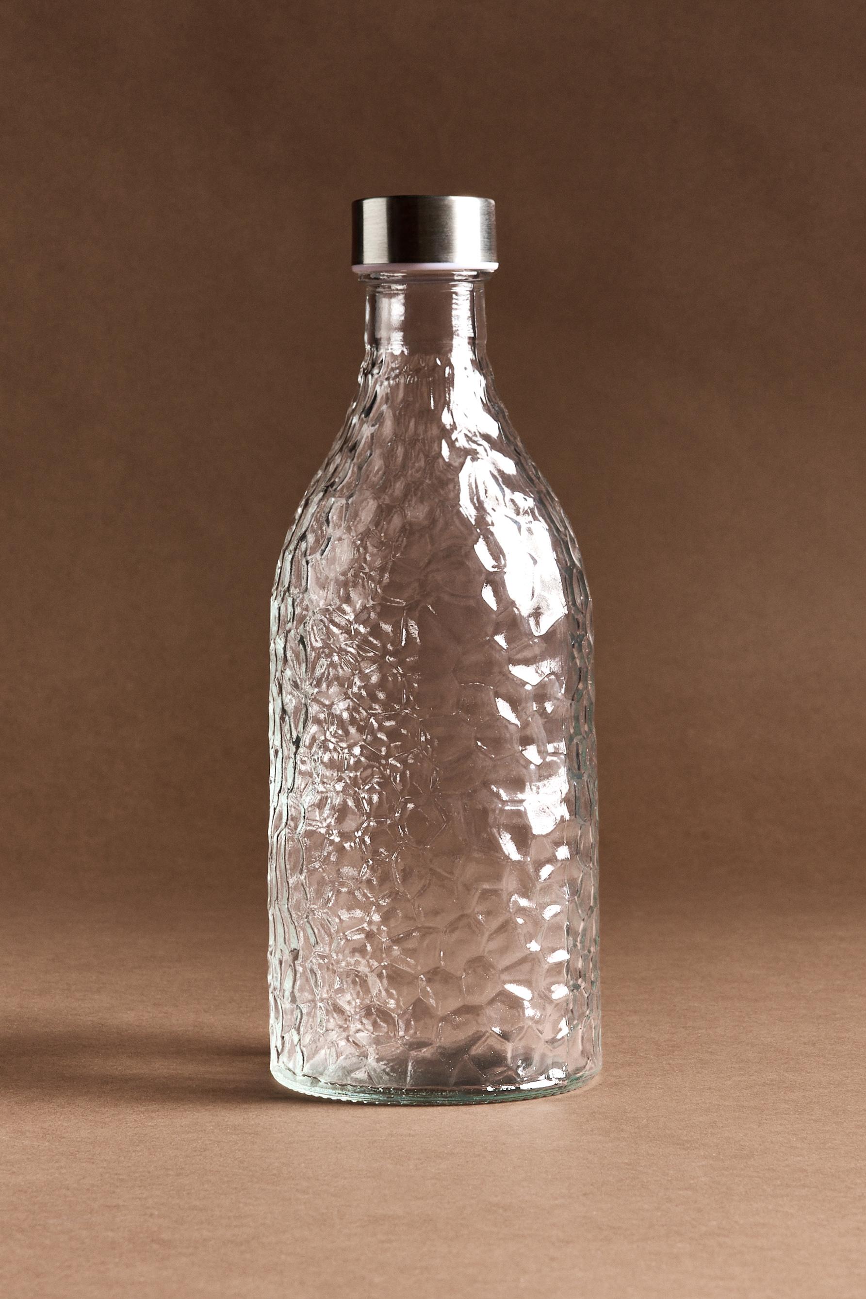 Botella vidrio efecto roca
