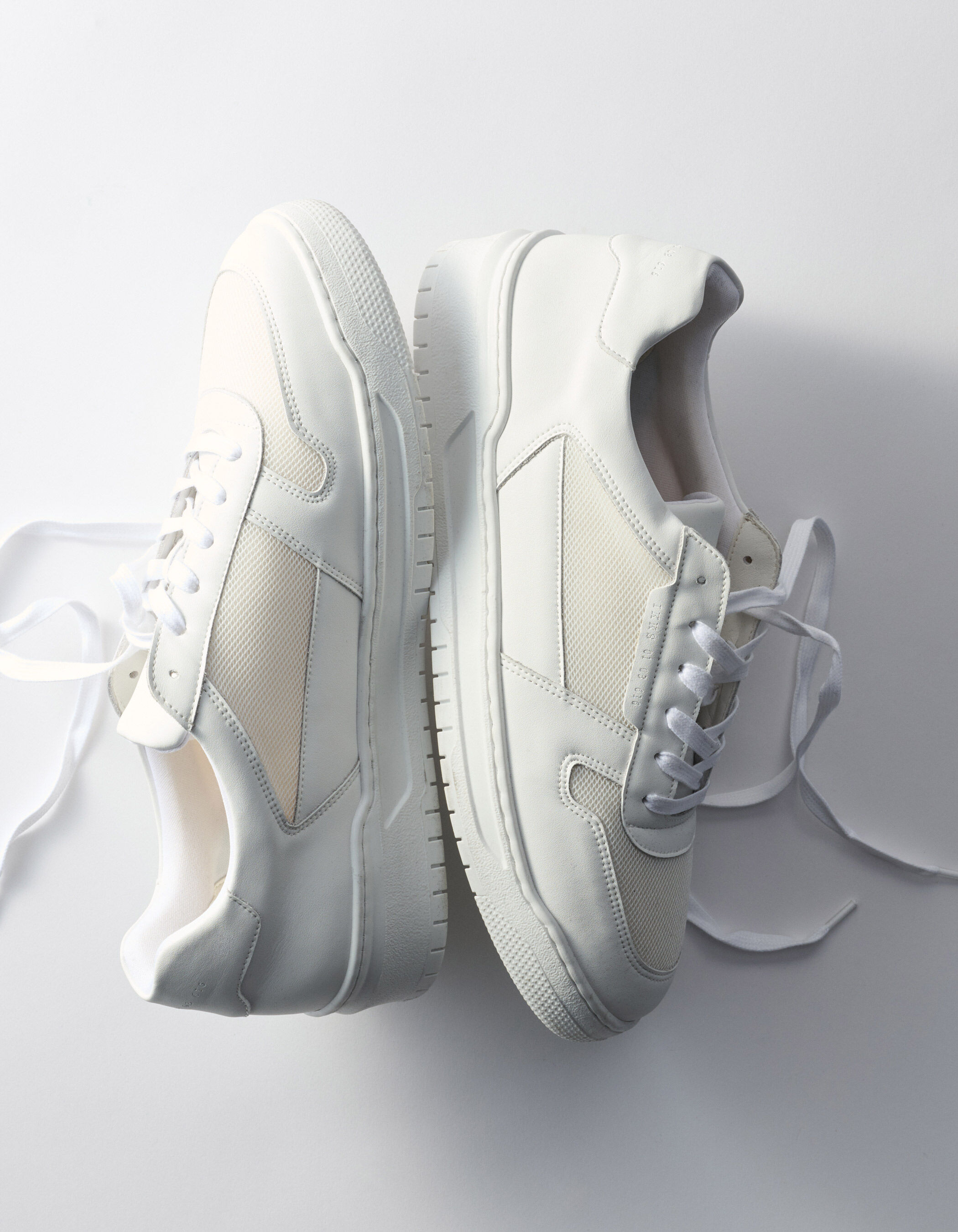 Baskets blanches bi-matières Homme