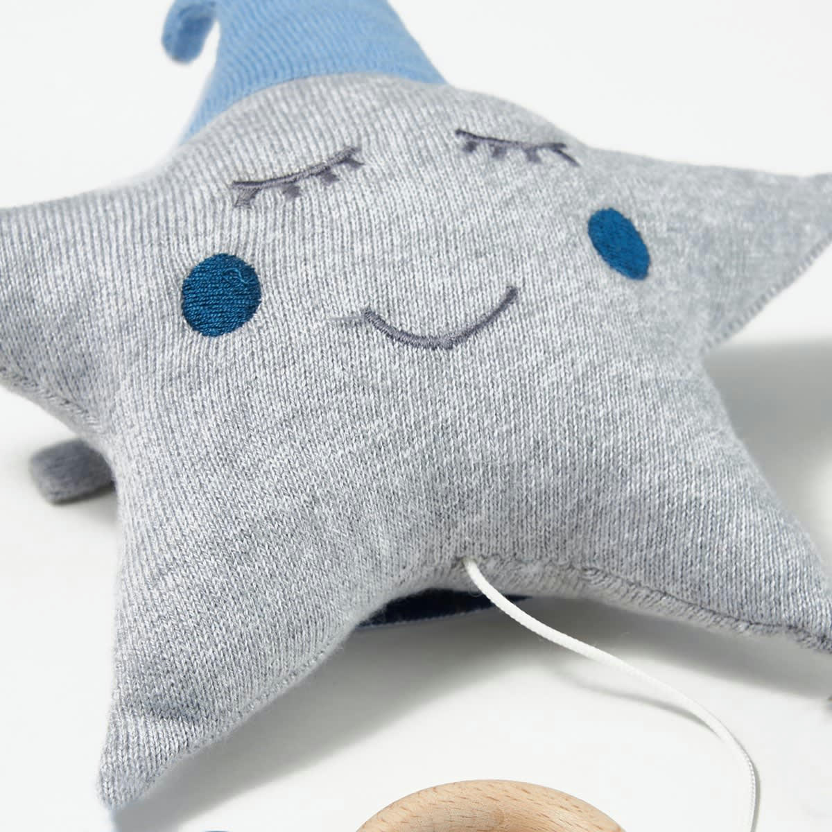 - Peluche musicale bébé en coton tricoté étoile bleu 22x22 cm