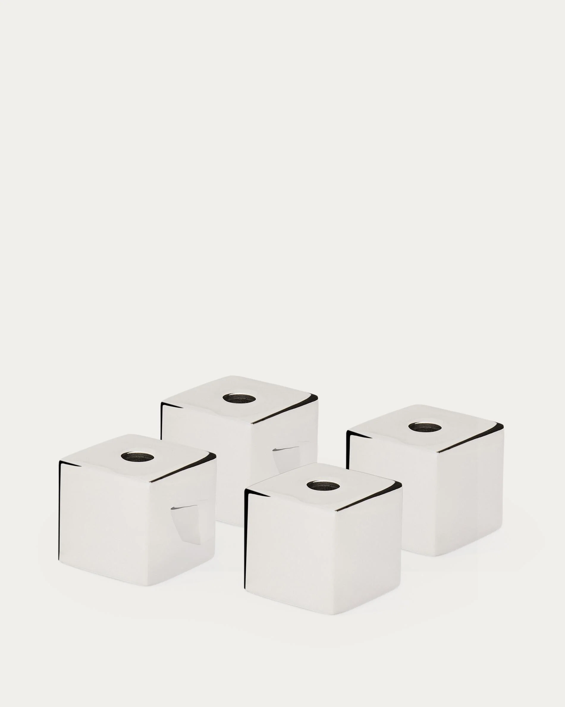 Acadia set of 4 stainless steel candle holders with a shiny silver finish