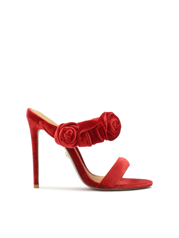 Red mules with three-dimensional decoration
