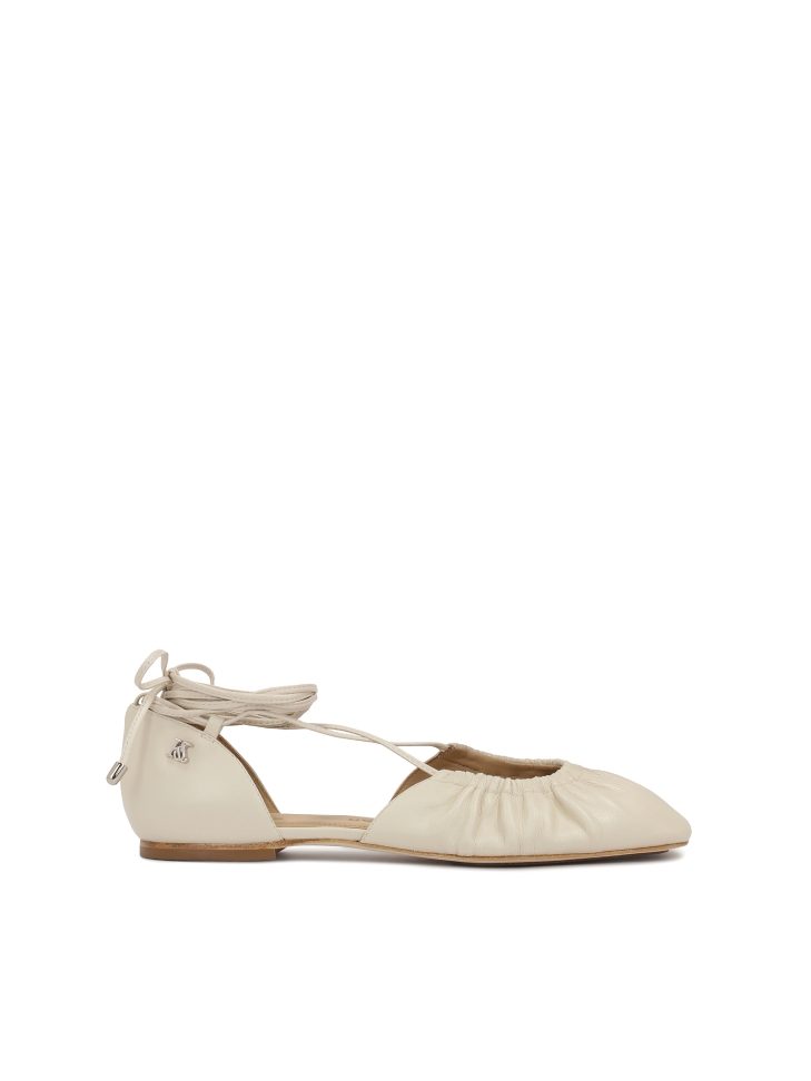 Cream ballerinas with cutout upper