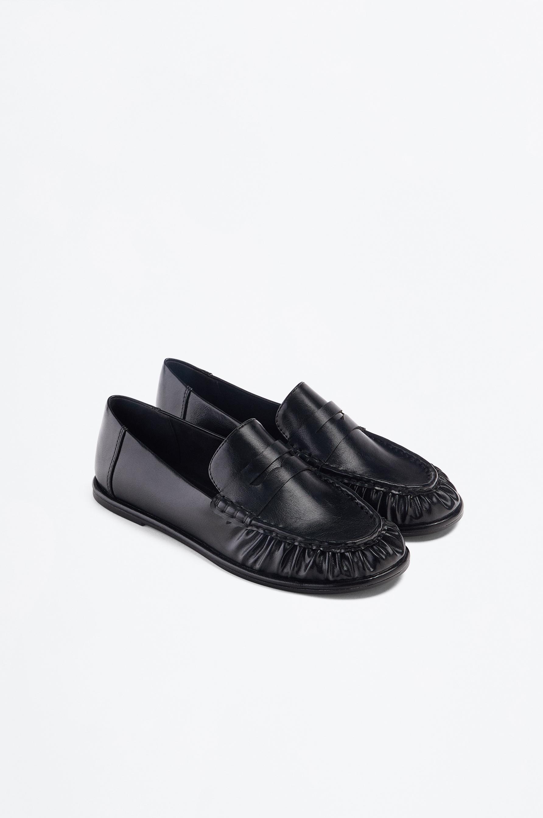 Mocasín fruncido