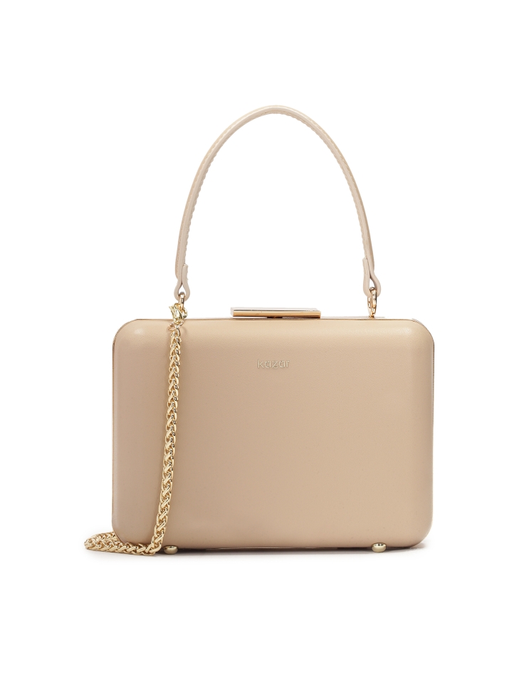 Rigid box bag covered with leather