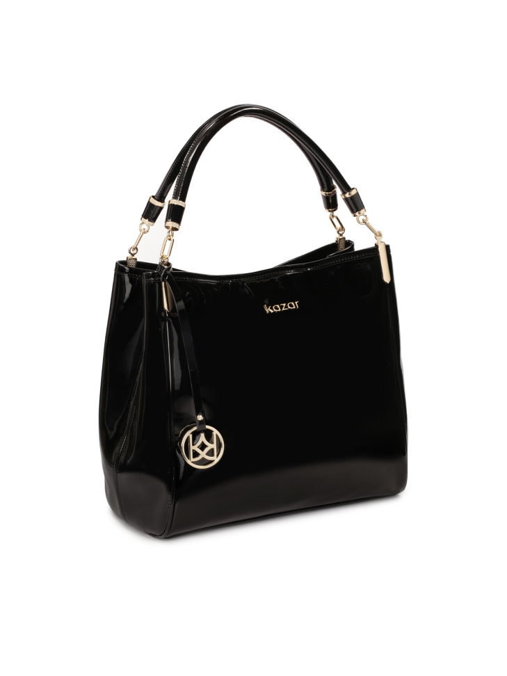 Patent shoulder bag with key ring