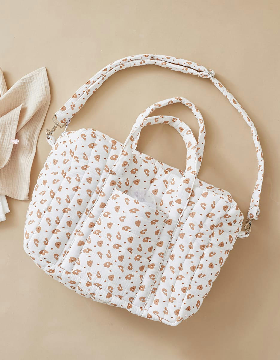 - Sac à langer imprimé léopard en mousseline ouatinée, écru/terracotta