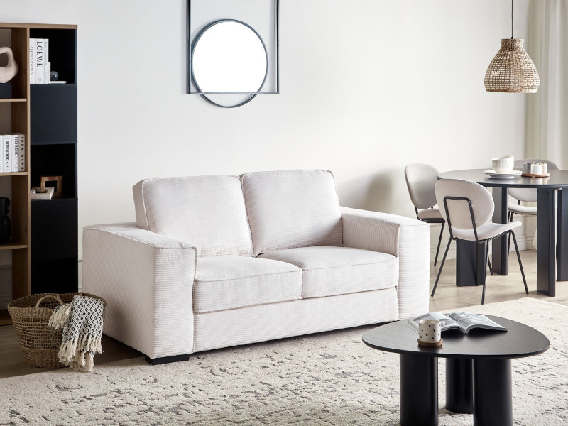 Sofa dwuosobowa sztruksowa poduszki biała