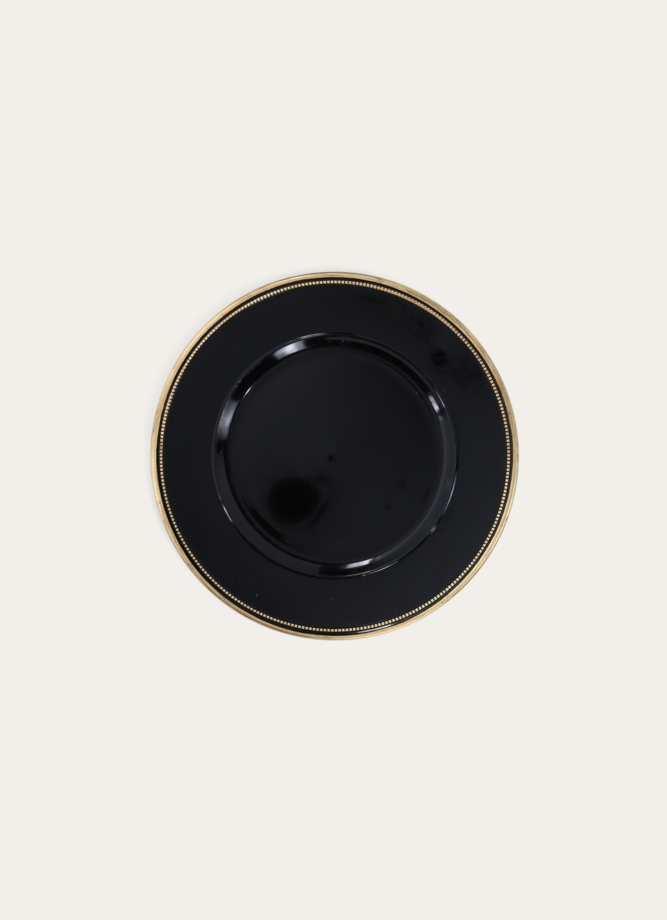 PLAT DE PRÉSENTATION AVEC UN LISERÉ NOIR/OR