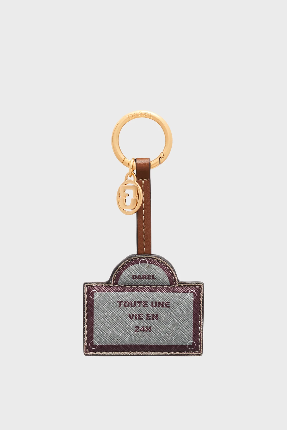 Charm en toile enduite et cuir –UNE VIE EN 24H