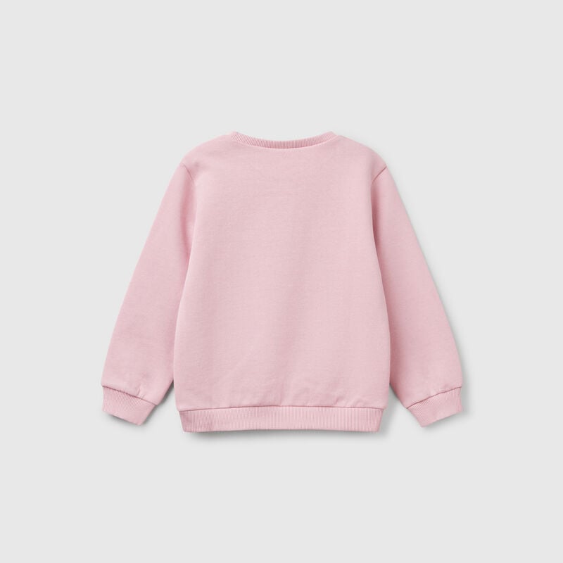 Sweatshirt with petal look applique
