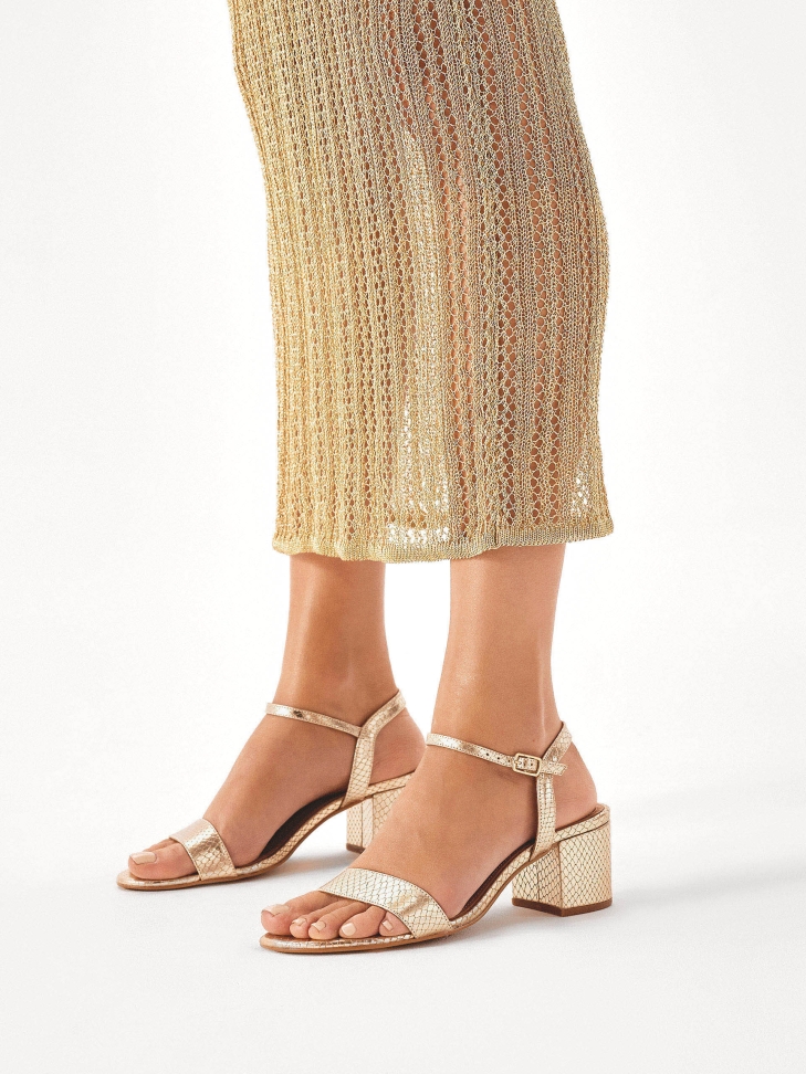 Gold low-heeled sandals