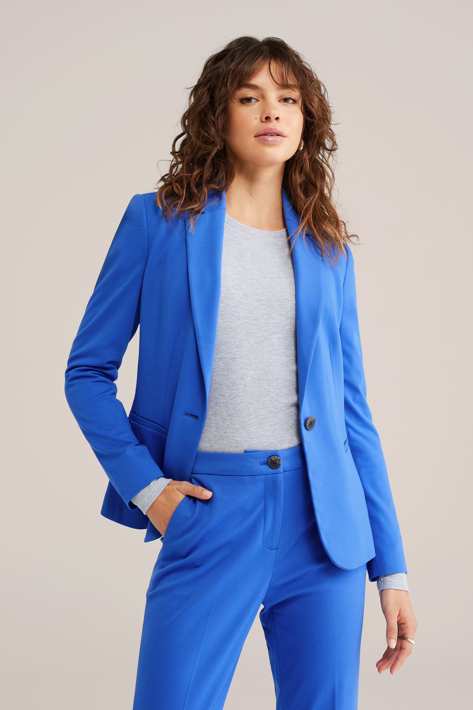 Dames Getailleerde jersey blazer en slim fit pantalon met strech