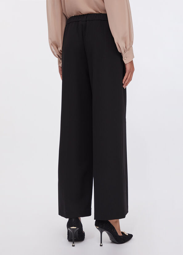 Pantaloni cropped con cintura