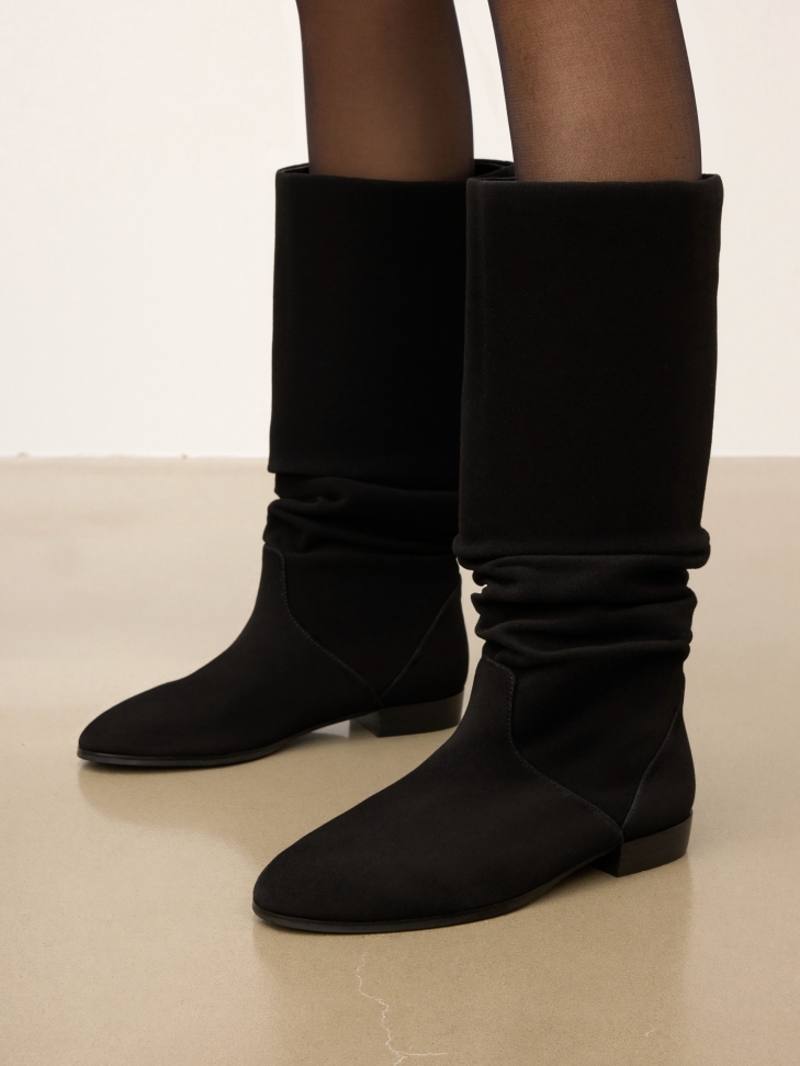 Suede boots on a flat sole