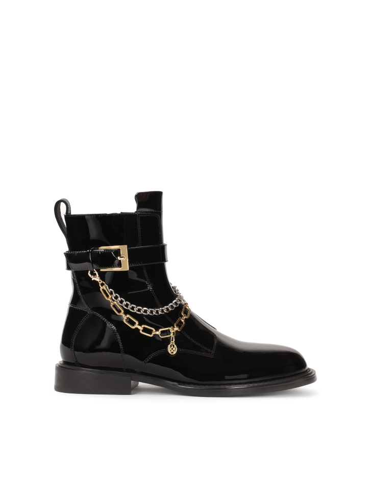 Patent leather boots decorated with chains