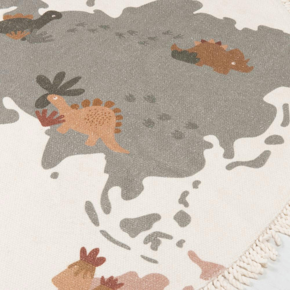 YUMA - Tapis enfant rond en coton recyclé tissé imprimé mappemonde dinosaures multicolore à franges D110