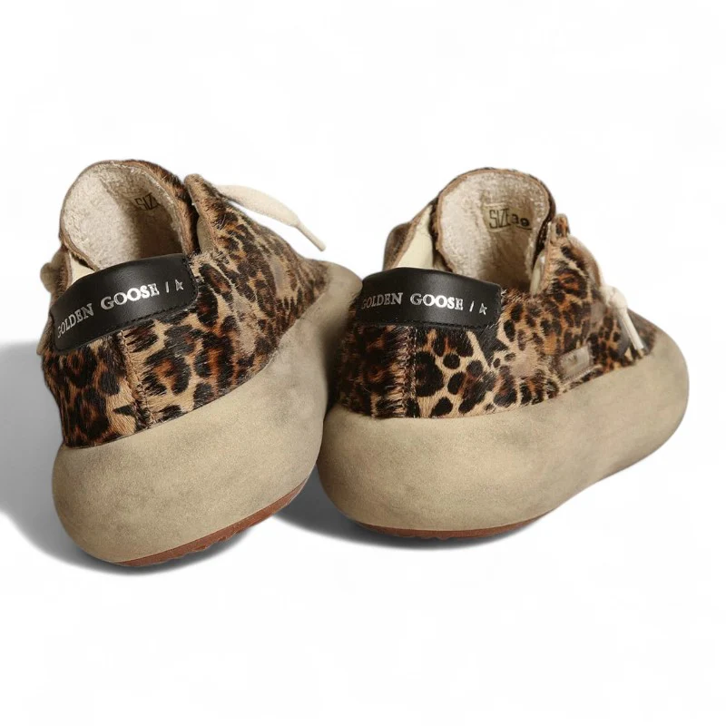 Space-Star shoes in leopard-print pony skin with black leather star and heel tab