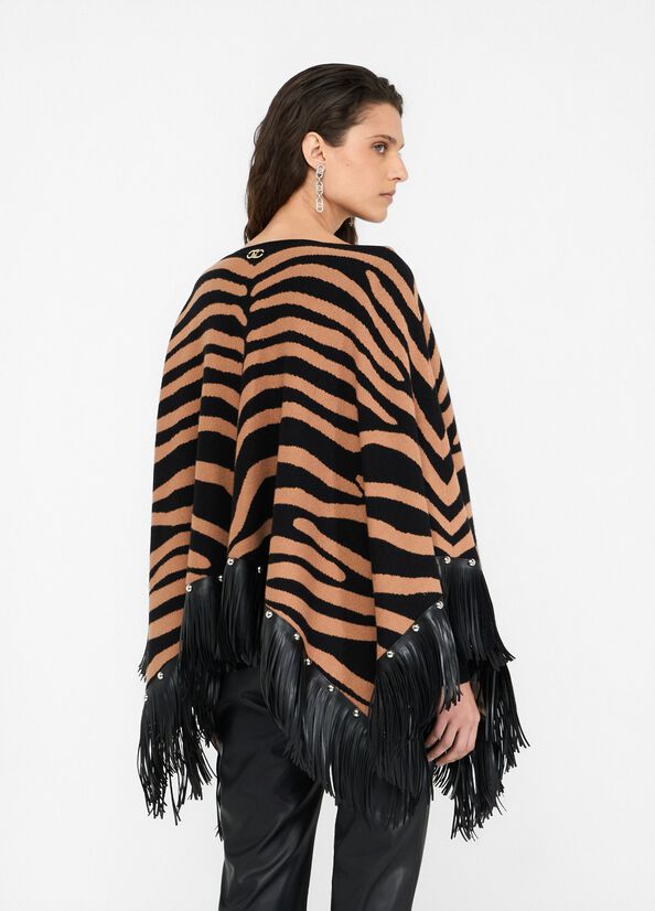 Poncho zebrato con frange