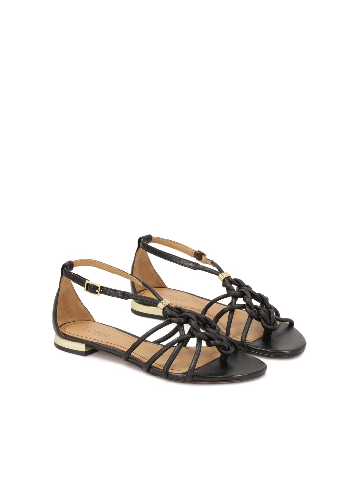 Black flat sandals with gold heel