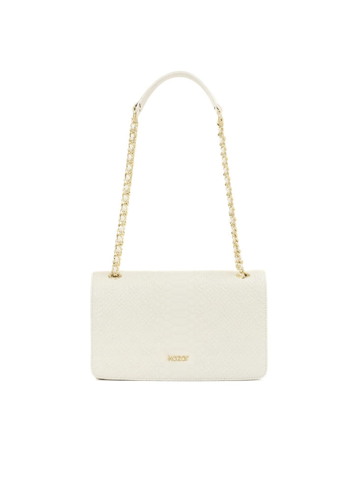 White leather handbag with embossed pattern flap