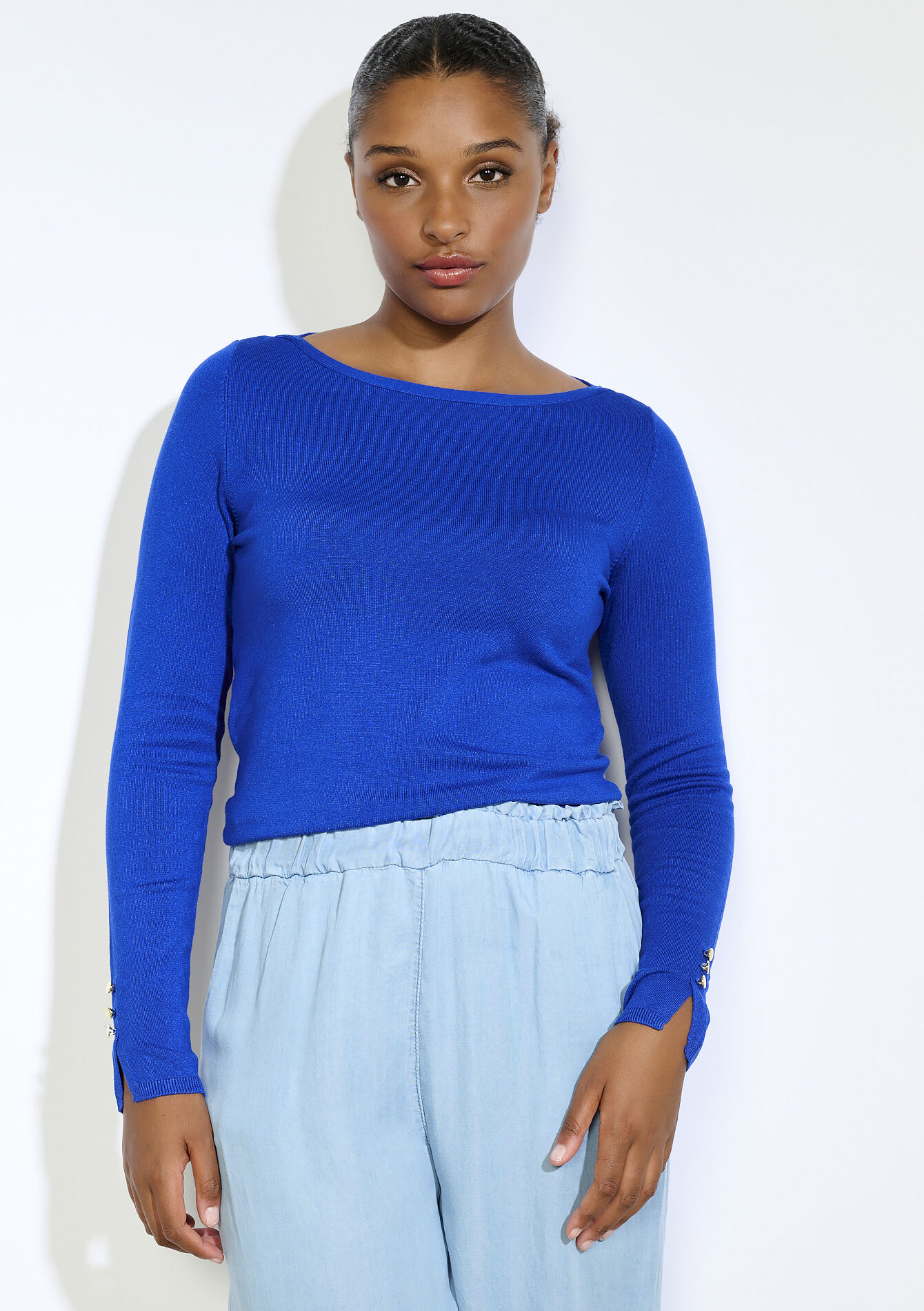 Trui met gouden knopen