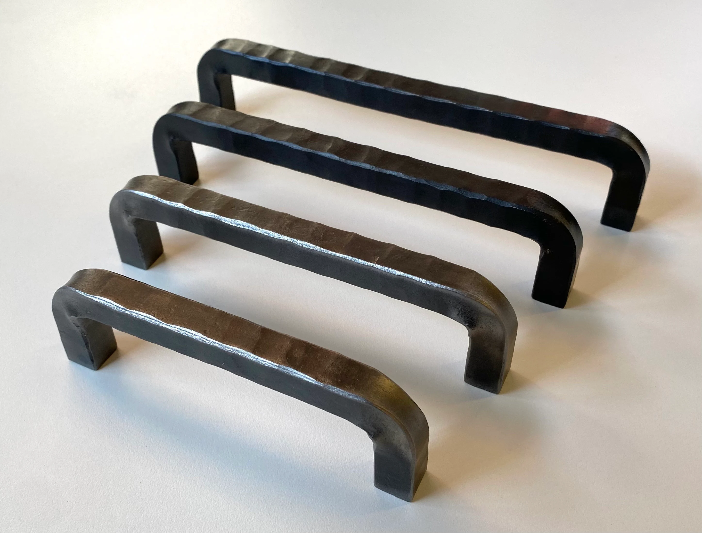 Hand forged hammered cabinet pulls. 1/2” square stock. (Everett)