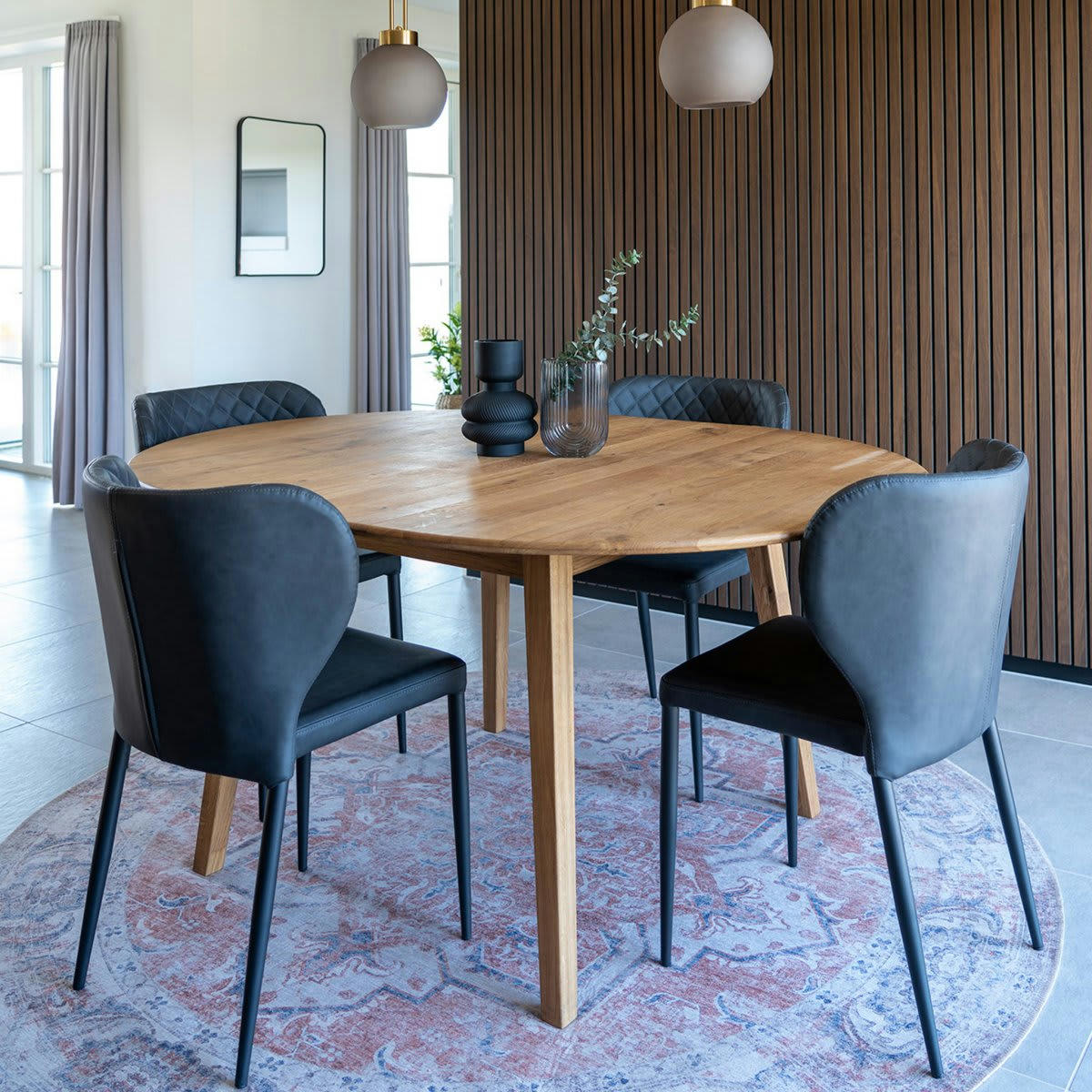 MEGAN - Chaise en simili matelassé pieds métal noir gris foncé