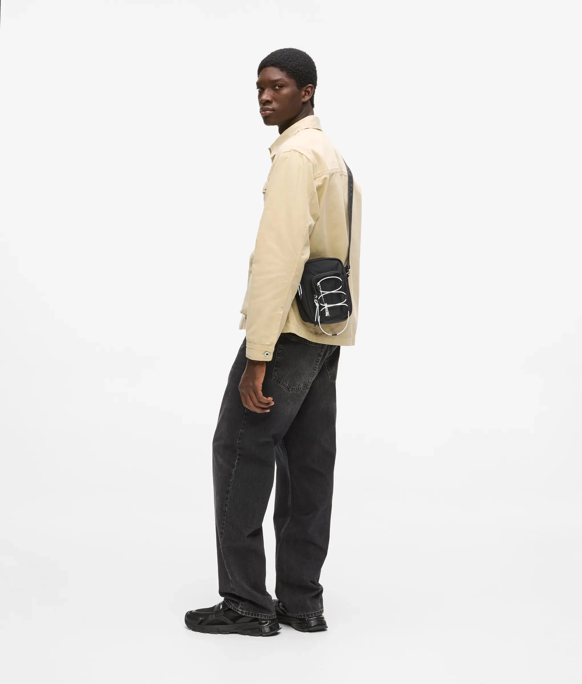 Sac reporter de style utilitaire avec cordon de serrage