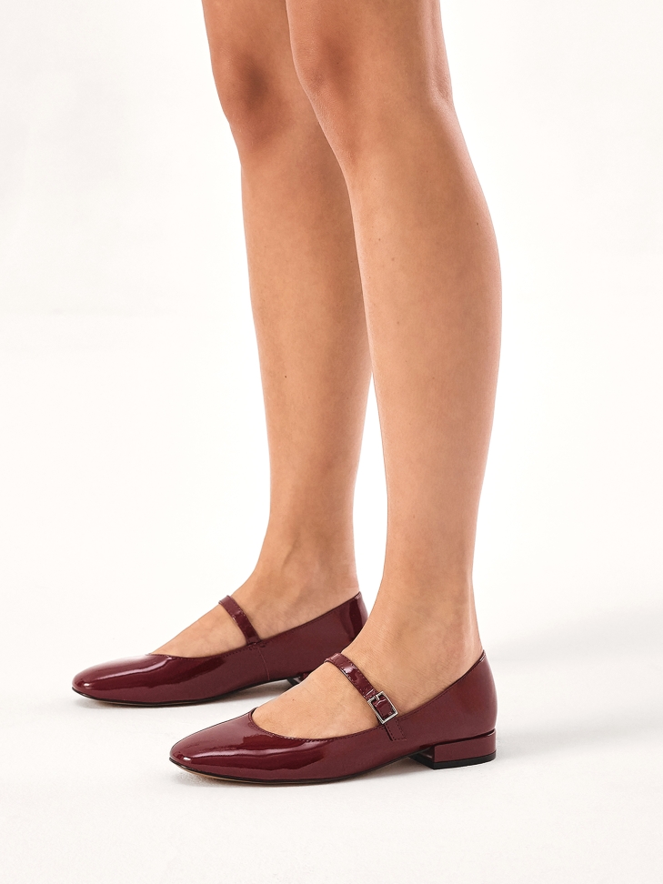 Maroon patent leather Mary Jane pumps
