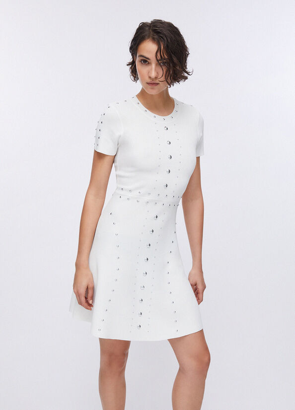 Abito in maglia con borchie